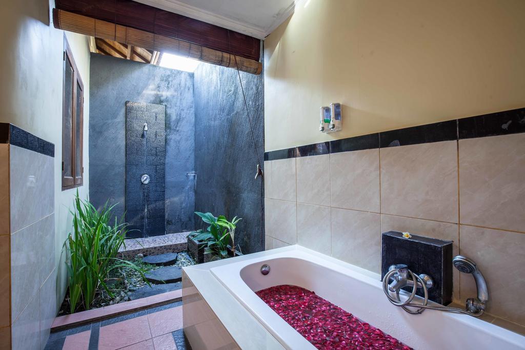 Putri Bali Villa Seminyak Quarto foto