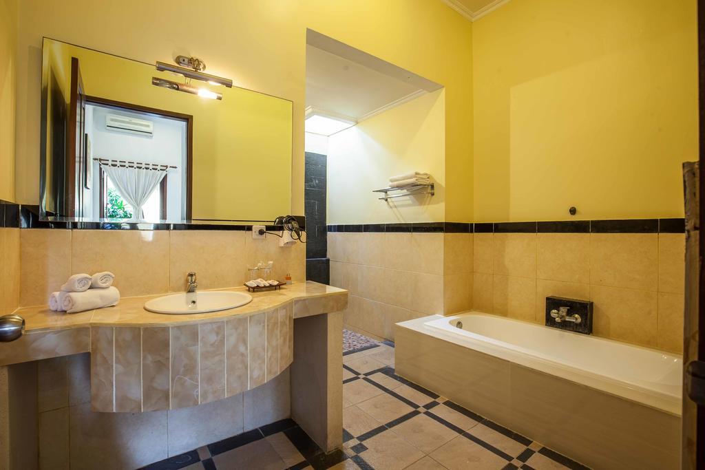 Putri Bali Villa Seminyak Quarto foto